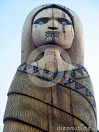 Blue-eyed woman Maori carving Editorial Stock Photo