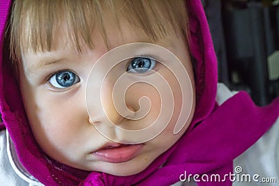 Adorable baby girl with blue eyes Stock Photo