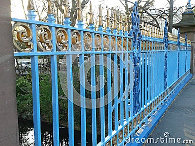 Blue fence over canal Stock Photo