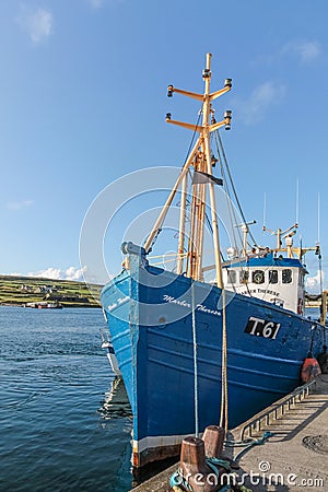 Blue fishing boat in the port Editorial Stock Photo