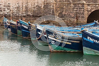 Blue fishing boats in a dock Editorial Stock Photo
