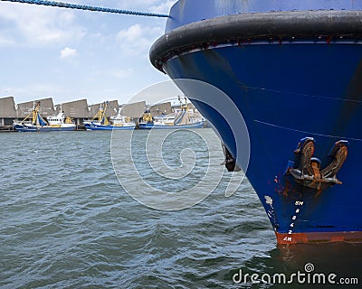 Blue fishing boats lie in scheveningen harbor Editorial Stock Photo