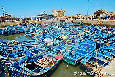 Blue fishing boats in the port of Essaouira, Morocco Stock Photo