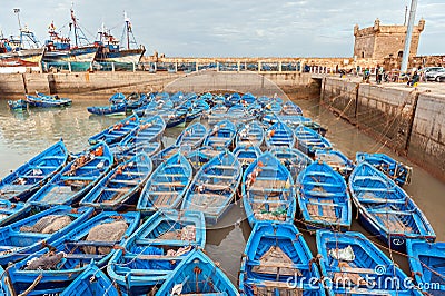 Blue fishing boats in Sqala du Port harbor Editorial Stock Photo