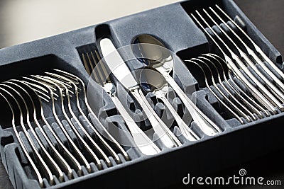 Blue flatware box isolated on black background. Stock Photo