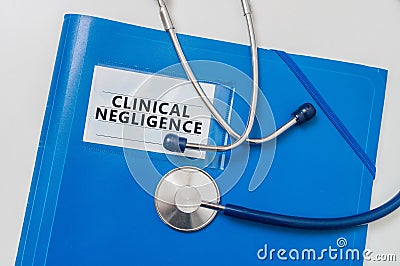 Blue folder with Clinical Negligence. Medical failure concept Stock Photo