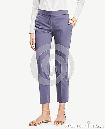 Blue formal pants for womenâ€™s paired with shite full sleeve T-Shirt and flat footwear with white background Stock Photo