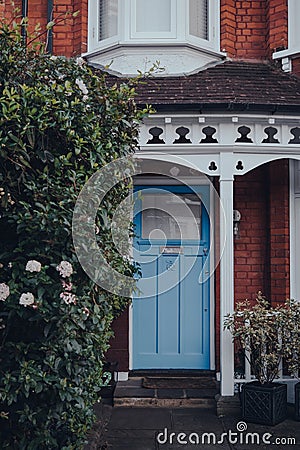 Blue front door a traditional Edwardian house in London, UK Editorial Stock Photo