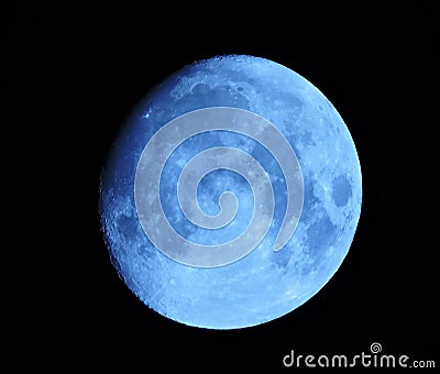 Blue gibbous moon Stock Photo