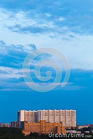 Blue gloaming sky over urban house in summer Stock Photo