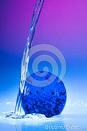 Blue globe with water drops Stock Photo