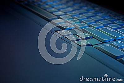 Blue Glowing PC Laptop Keyboard Stock Photo