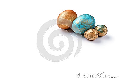 Blue and golden modern easter eggs on a white background. Copy space. Stock Photo