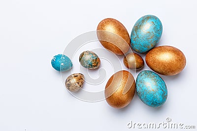 Blue and golden modern easter eggs on a white background. Like the shape of a flower Stock Photo