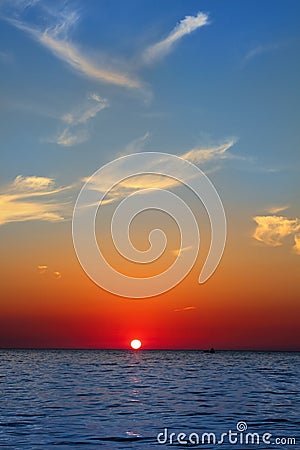 Blue golden sunrise seascape sea ocean red sky Stock Photo