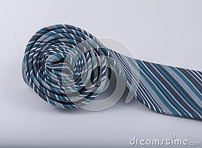 Blue gray striped gentlemans tie isolated on the white Stock Photo