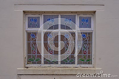 Blue and green lead stained window Stock Photo