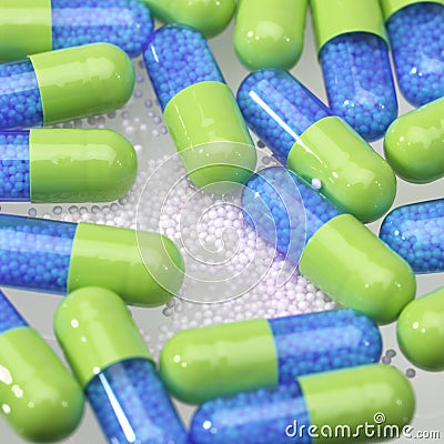 Blue and green pills Stock Photo