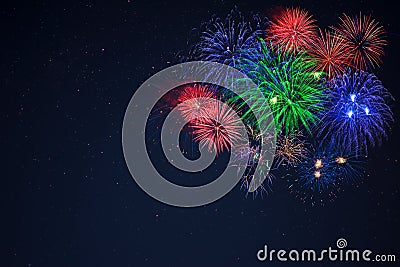 Blue green red fireworks located right side Stock Photo
