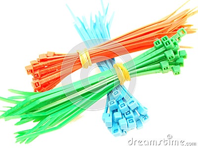 Blue, green and red plastic wire ties Stock Photo