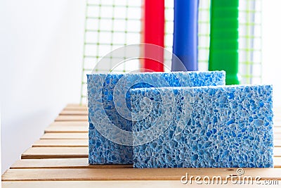 Blue harmless sponges from cellulose with detergents. Healthy washing dishes Stock Photo