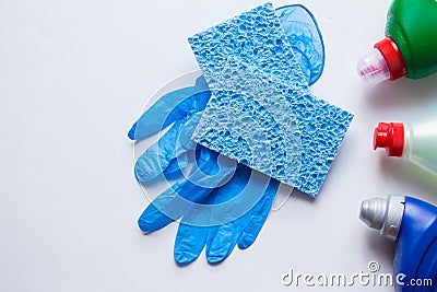 Blue harmless sponges for washing dishes from cellulose with rubber gloves and detergents Stock Photo