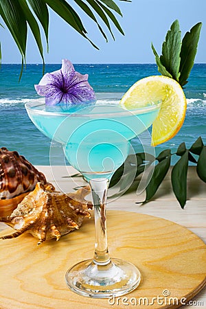 Blue Hawaiian cocktail on the tropical beach Stock Photo