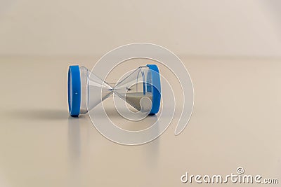 Blue hourglass on white background Stock Photo