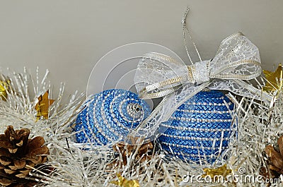 Blue Ð¡hristmas balls, tinsel and pinecones Stock Photo