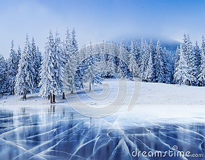 Blue ice and cracks on the surface of the . Stock Photo