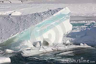 Blue ice on the thawing river in the spring, Altai Stock Photo