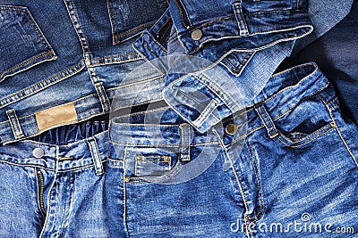 Blue jeans background overlapping Modern fashion jeans - top view Stock Photo