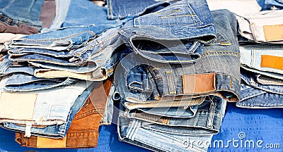 Blue jeans denim fashion pants mixed stacked Stock Photo