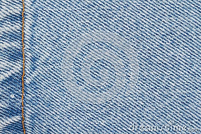 Blue jeans denim material with stiches background Stock Photo