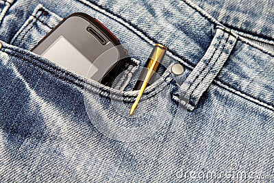 Blue jeans pocket with phone and pen Stock Photo