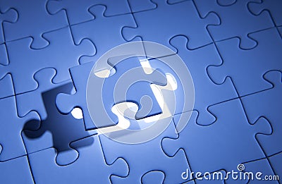 Blue jigsaw puzzle. Business solutions, solving problems,science technology and team building concept Stock Photo