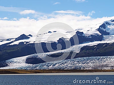 Blue lagoon with iceberg glacier tongue near Jokulsarlon lagoon Stock Photo