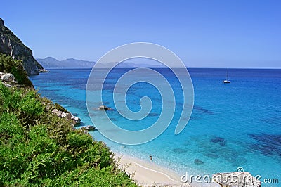Blue lagoone with cliffs and stone / Cala Goloritze, Sardinia Stock Photo