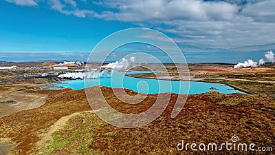 Iceland, Reykjanes, Gunnuhver. Blue lake, blue sky, red earth and just unearthly view. Stock Photo