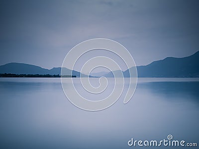 Blue lake at twilight Stock Photo