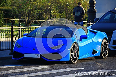 Blue Lamborghini Huracan sports car, front and left side view Editorial Stock Photo