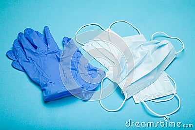 Blue latex doctor gloves and medical mask Stock Photo