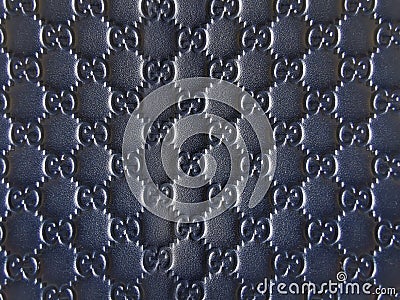 Blue leather background of gucci monogram logo Editorial Stock Photo