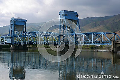 The blue Lewiston Clarkston bridge spanning the Snake River Stock Photo