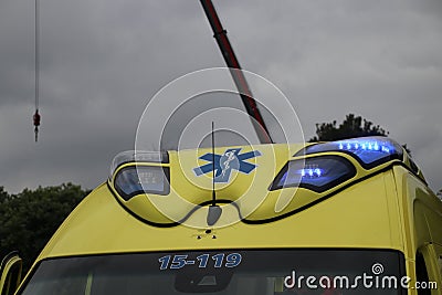 Blue light on the light console on the roof of an ambulance Editorial Stock Photo