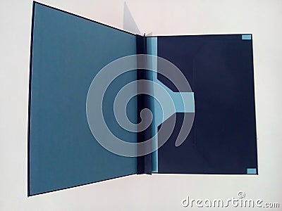 A blue map with a thick cover. A place to store document file. Stock Photo