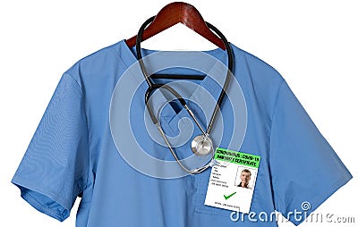 Blue scrubs shirt for medical professional with immunity certificate Stock Photo