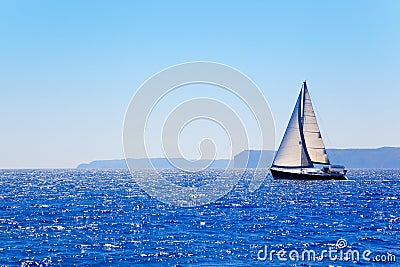 Blue Mediterranean sailboat sailing Stock Photo