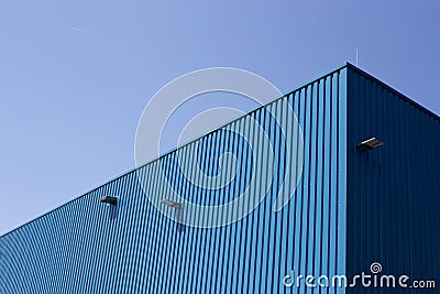 Blue Metal Building On Sky Background Royalty-Free Stock Photography