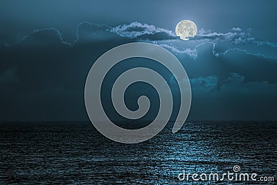 Blue moon light reflecting off ocean. Romantic twilight moonlight Stock Photo